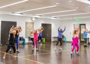 A fitness class at the Coral Gables Adult Activity Center, which offers year-round programming that keeps seniors active, connected, and engaged beyond Senior Citizens Week. (Photo: City of Coral Gables, Vanessa Fonte.