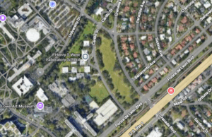 An aerial map showing Lincoln Park as a long green space between University of Miami campus buildings and nearby residential streets, bordered by Ponce de Leon Boulevard and Granada Boulevard.