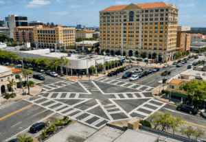 Artist’s rendering of the Miracle Mile and Ponce de Leon Boulevard intersection with diagonal pedestrian crosswalks forming an X across the center of the roadway.