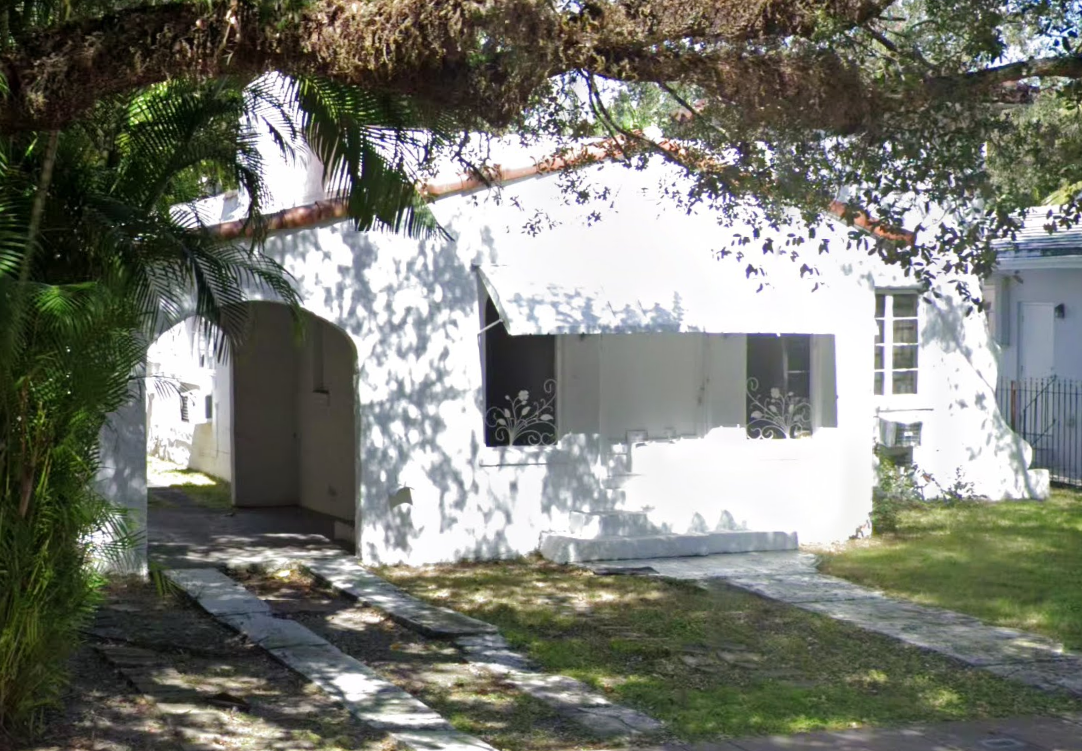 Exterior view of a historic residential property at 1129 Sevilla Avenue in Coral Gables.