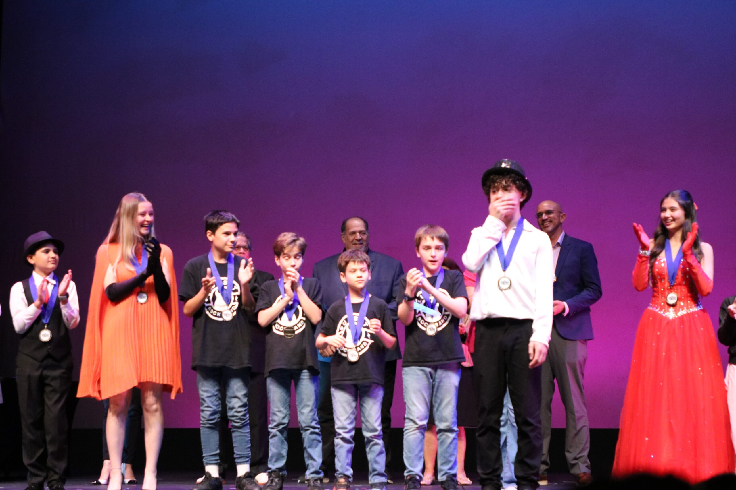 Category winners at the 2025 Young Talent Big Dreams Competition congratulate Grand Prize winner Tamerlan Guliyev (in white shirt) and his victory.