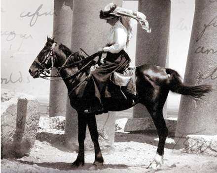 Black-and-white archival photograph of a woman in a wide-brimmed hat and long skirt riding a dark horse among tall stone columns, with handwritten script layered in the background.