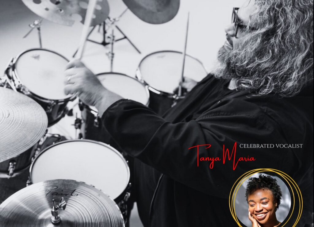 Black-and-white image of a drummer at a drum kit with an inset color portrait of a smiling woman and the words “Celebrated Vocalist Tanya Maria.”