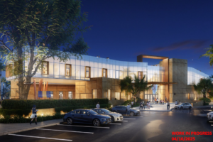 Architectural rendering of the proposed War Memorial Youth Center replacement at night, showing a large illuminated multi-story building, entrance plaza, trees and parked cars.